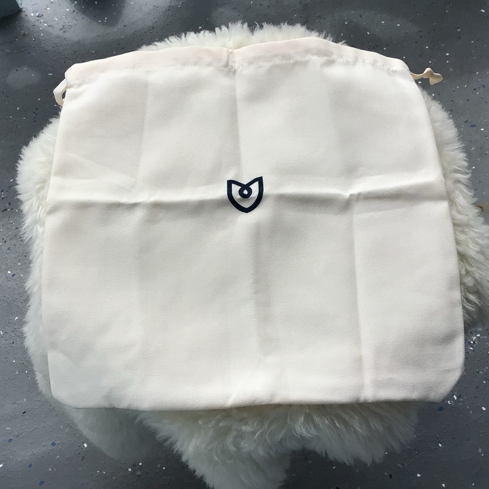 Rothy’s Cream Drawstring Bag with Logo